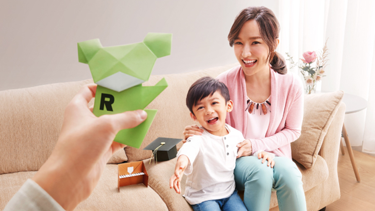 Happy man makes government tax letter into origami; image used for HSBC Personal Tax Loan in 2019.