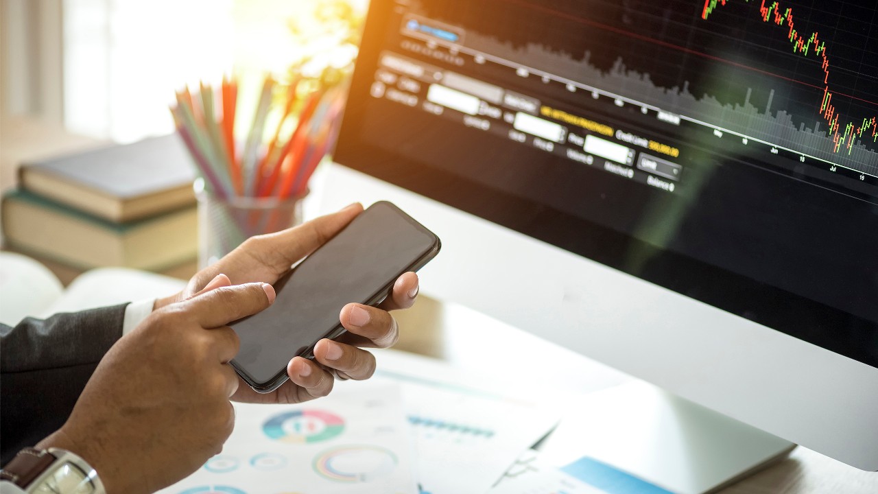 A man using mobile device; image used for digital service highlights