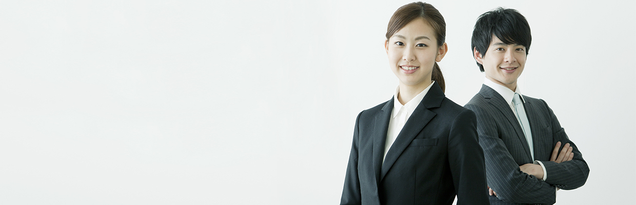 A young businesswoman and a young businessman;  image used in HSBC Broking careers page