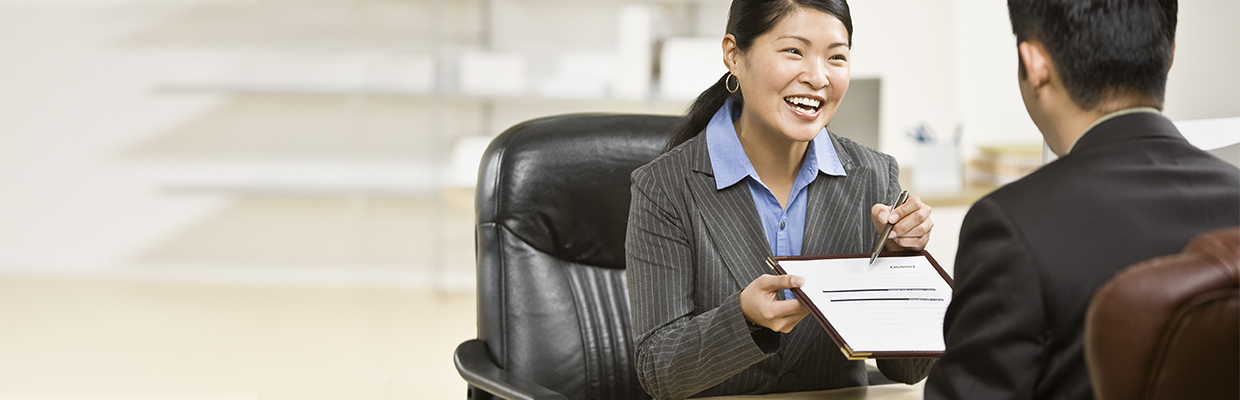 A woman is talking to her client; image used in forms and documents