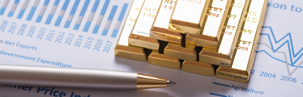 Gold bars placed on a table; image used in leveraged foreign exchange and precious metals product