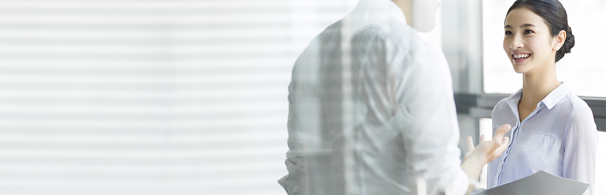 A woman talk to her teammate; image used in IPO products