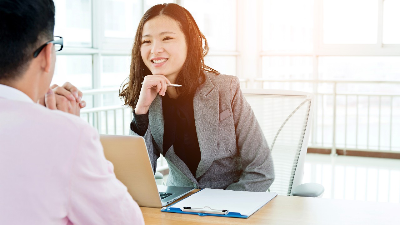 Businesswoman discussing with her visitor