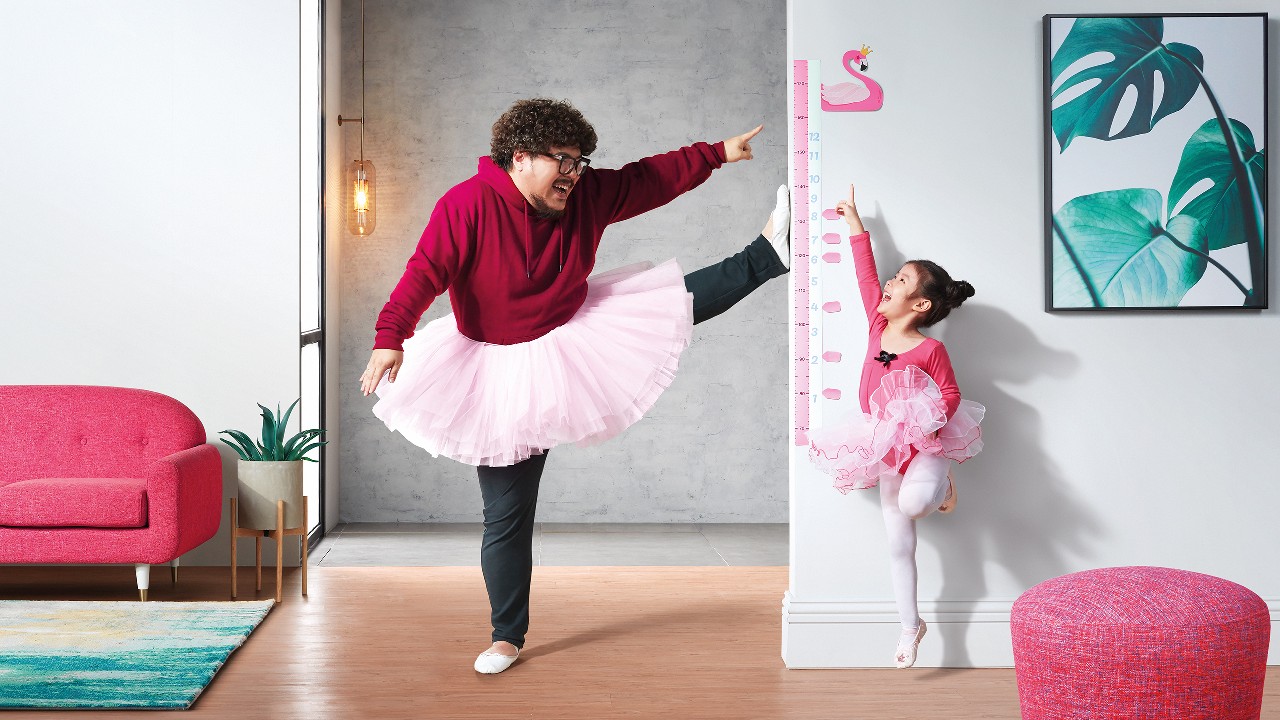 Ballet Daddy measuring height; image used for HSBC Family Goal Insurance Plan