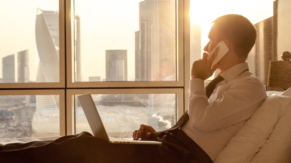 A business man is working in the evening; image used for daily FX focus