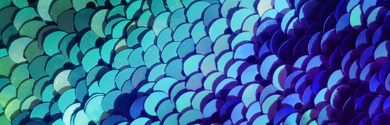Blue and green sequins; image used for HSBC Jade Investment financing.