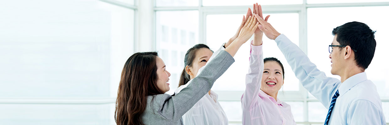 Four people are claping their hands to cheer up, image used for "Advice on starting a business" article