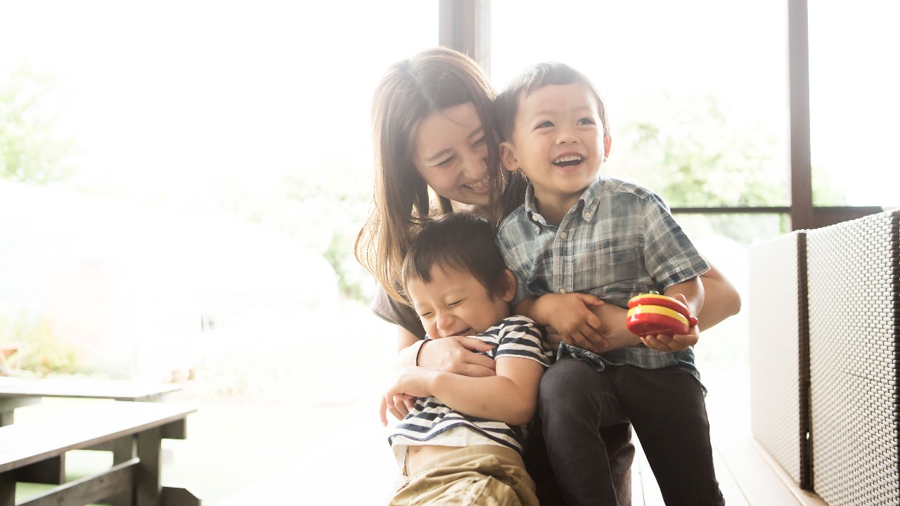 mother and son playing together