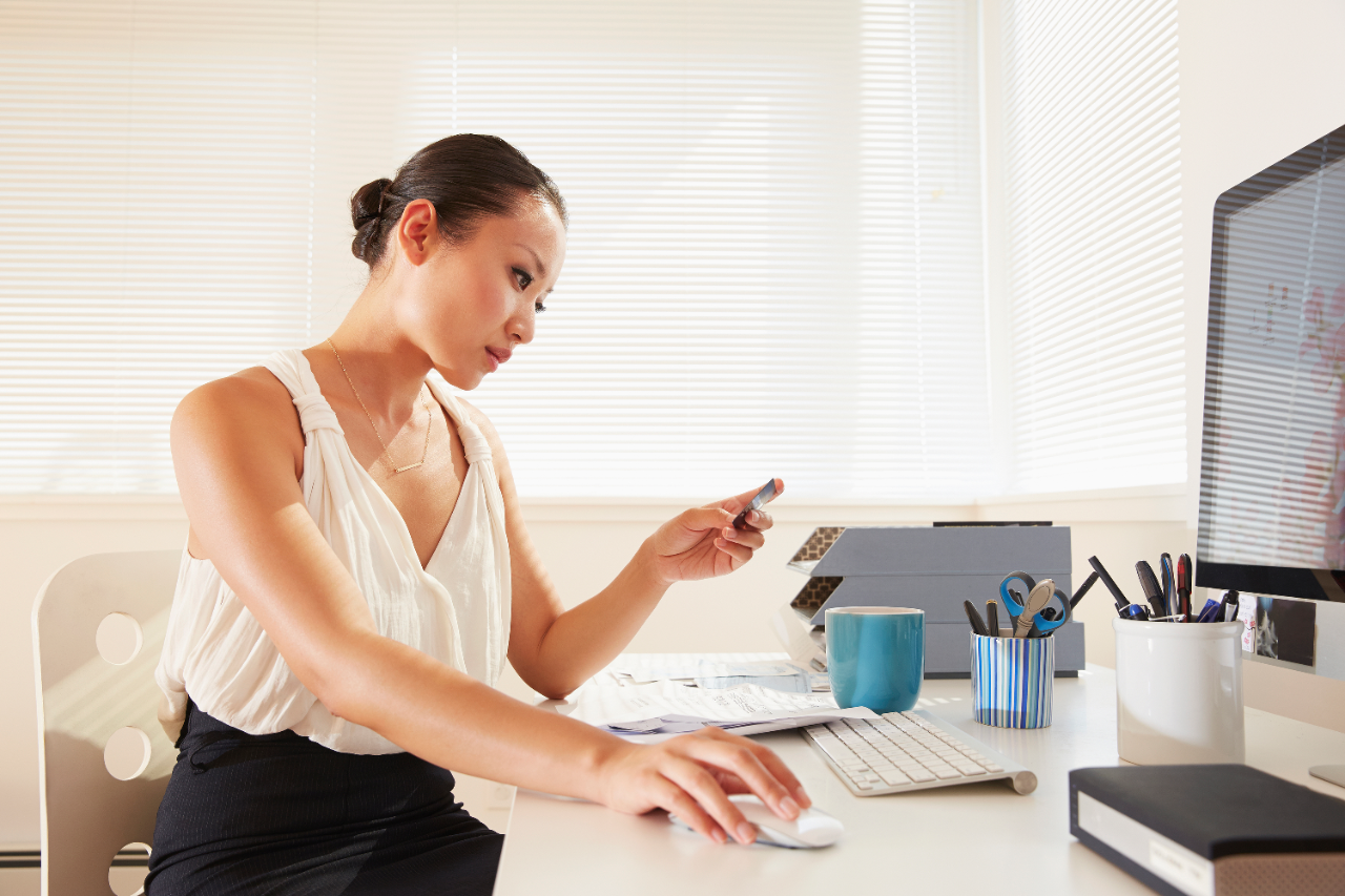 A young woman works in the office;  image used for MPF.